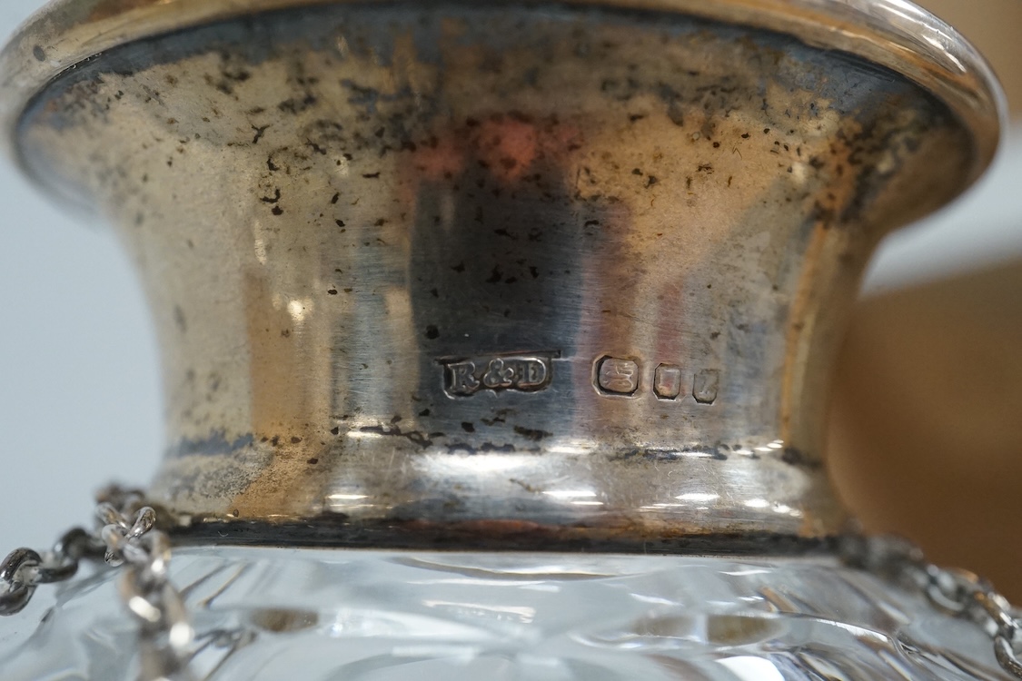 A late Victorian silver mounted cut glass mug, Saunders & Shepherd, Chester, 1899, height 13.4cm, together with a modern silver mounted cut glass decanter and a modern pair of silver 'Whisky' and 'Brandy' wine labels, J.